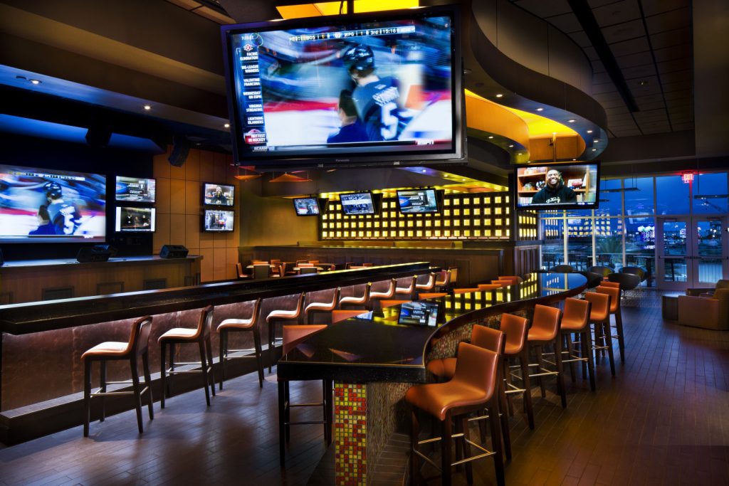 image of a sports bar with screens