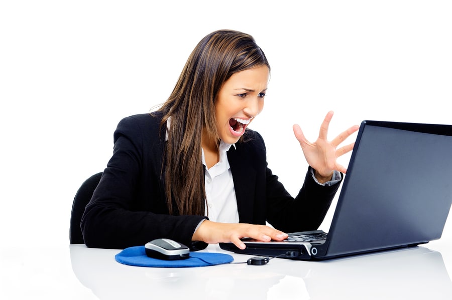 An office lady stressed in front of a computer