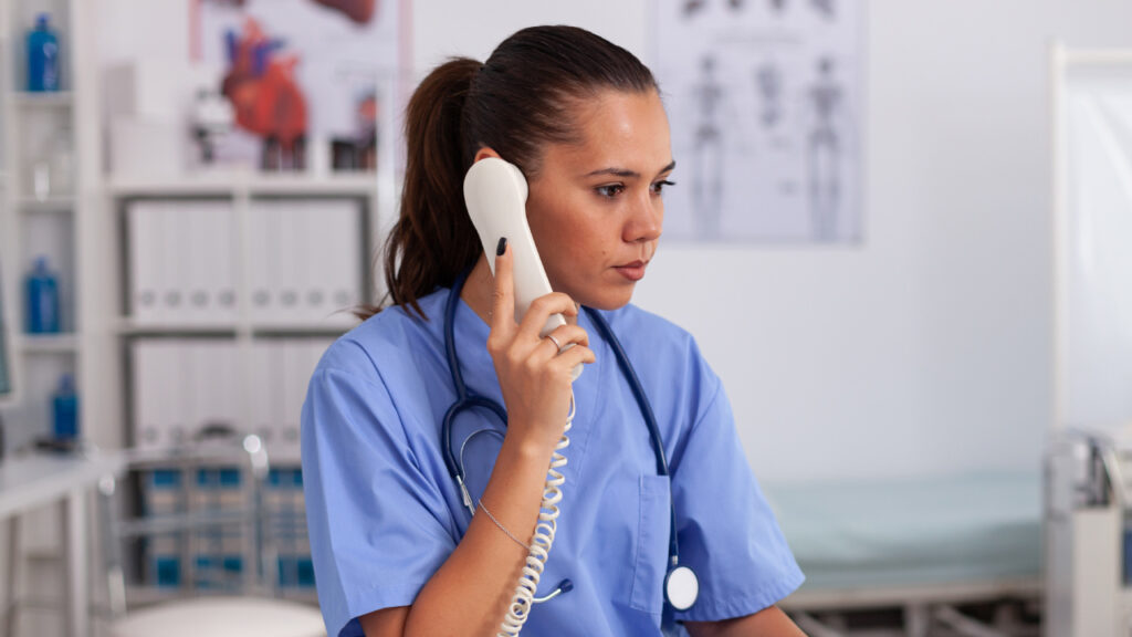 female doctor on a telephone